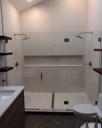 Chagrin Falls bathroom after renovation, glass shower and skylight