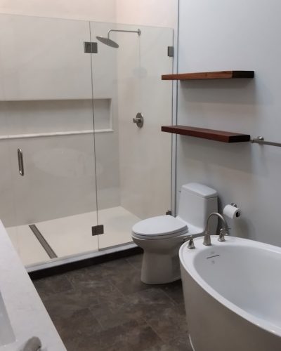 Chagrin Falls bathroom after renovation, freestanding tub and double vanity