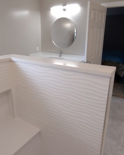 Strongsville bathroom wave tile shower and vanity view