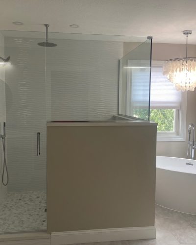 Strongsville bathroom glass shower and freestanding soaking tub